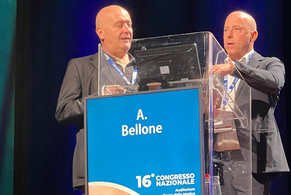 Il Dott. Alberto Bellone e il Dott. Galli al podio del 16° Congresso Nazionale AIMO, Roma 2026