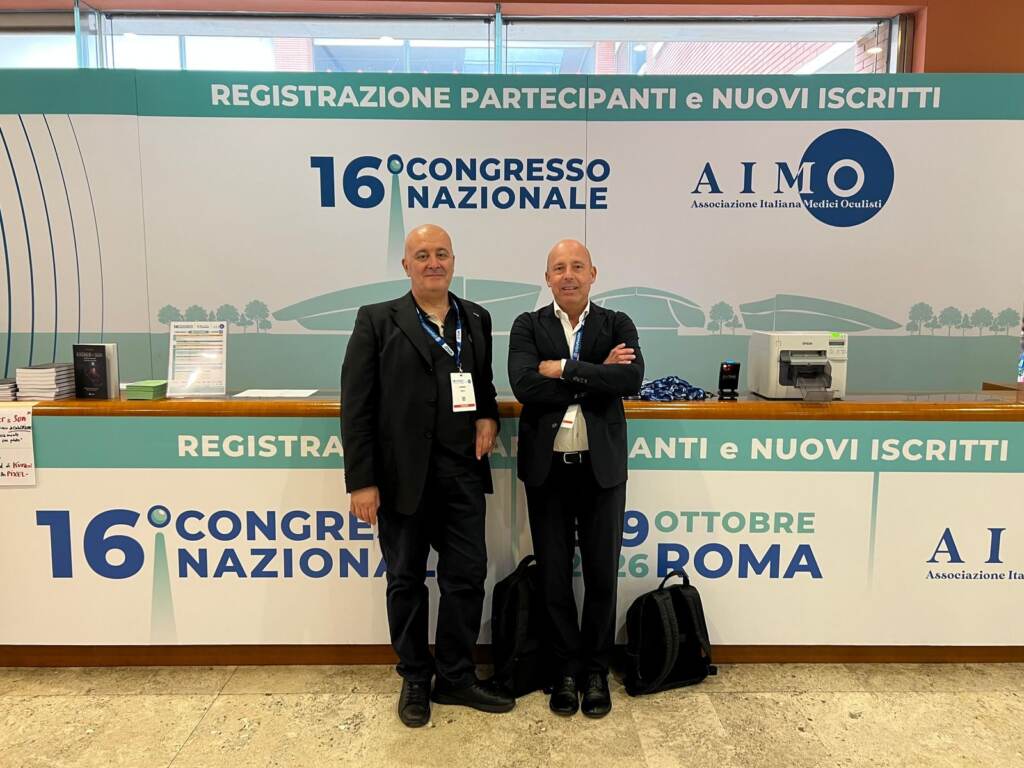 Il Dott. Alberto Bellone e il Dott. Galli all'area registrazione del 16° Congresso Nazionale AIMO di Roma